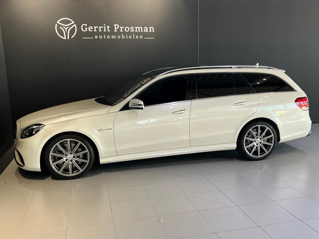 Mercedes-Benz E-klasse Estate E63 AMG 5.5 V8 Bi-Turbo 4MATIC, Auto's, Gebruikt, Wit, Leder, Stationwagon