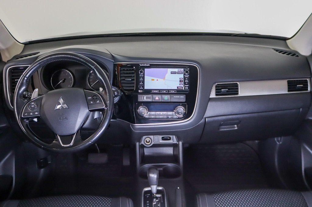 Mitsubishi Outlander 2.0 Executive Edition 7-Persoons Trekha, Auto's, Mitsubishi, 1998 cc, Stof, Euro 6, 4 cilinders