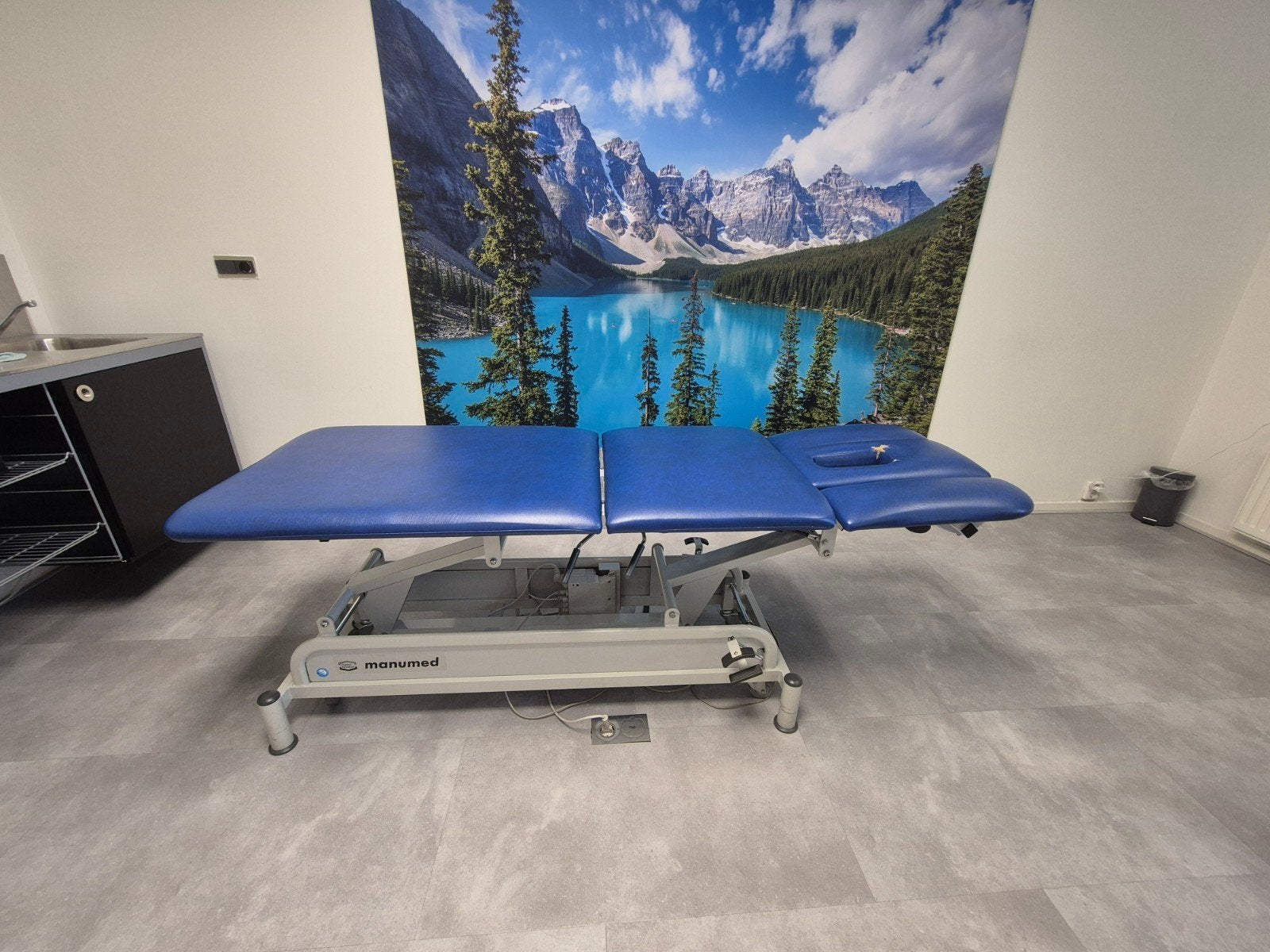 Behandelbank enraf nonius manemed hoog laag defect, Sport en Fitness, Massageproducten, Ophalen, Gebruikt, Massagetafel