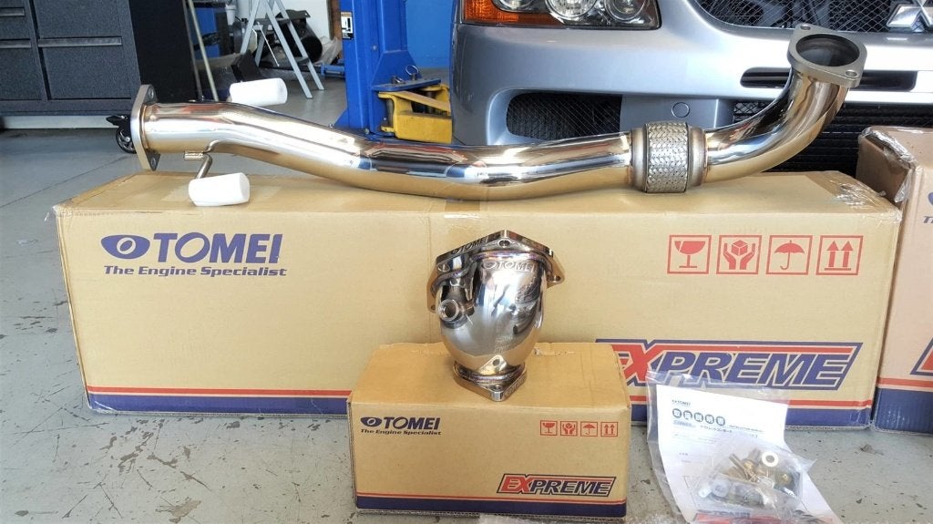 Tomei elbow downpipe - Mitsubishi Lancer Evolution Evo 7 8 9, Ophalen of Verzenden