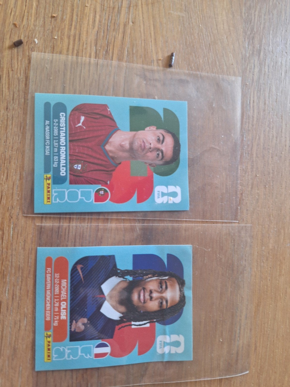 Ronaldo en Olise Panini spelerskaarten - Kopen of ruilen, Ophalen of Verzenden, Zo goed als nieuw, Buitenlandse clubs, Spelerskaart