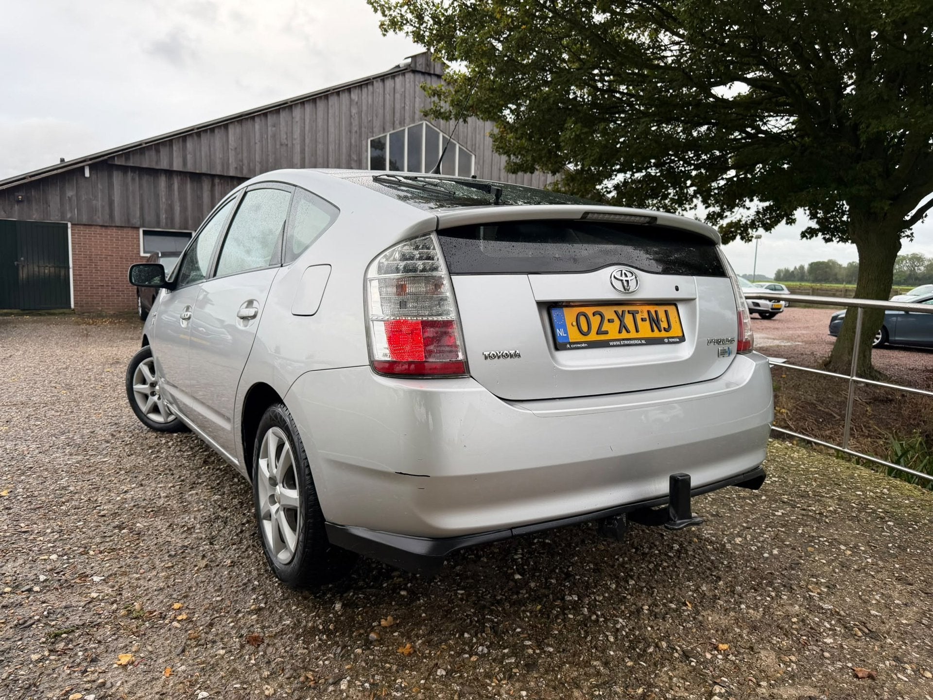 Toyota Prius 1.5 VVT-i Tech Edition | Keyless + Camera + Cru, Dealer onderhouden, 1497 cc, Gebruikt, Zwart