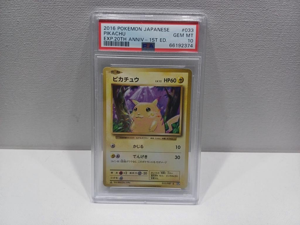 Pokemon Japanese Pikachu 1st ED. 20th Anniversary PSA 10, Ophalen of Verzenden, Nieuw, Losse kaart