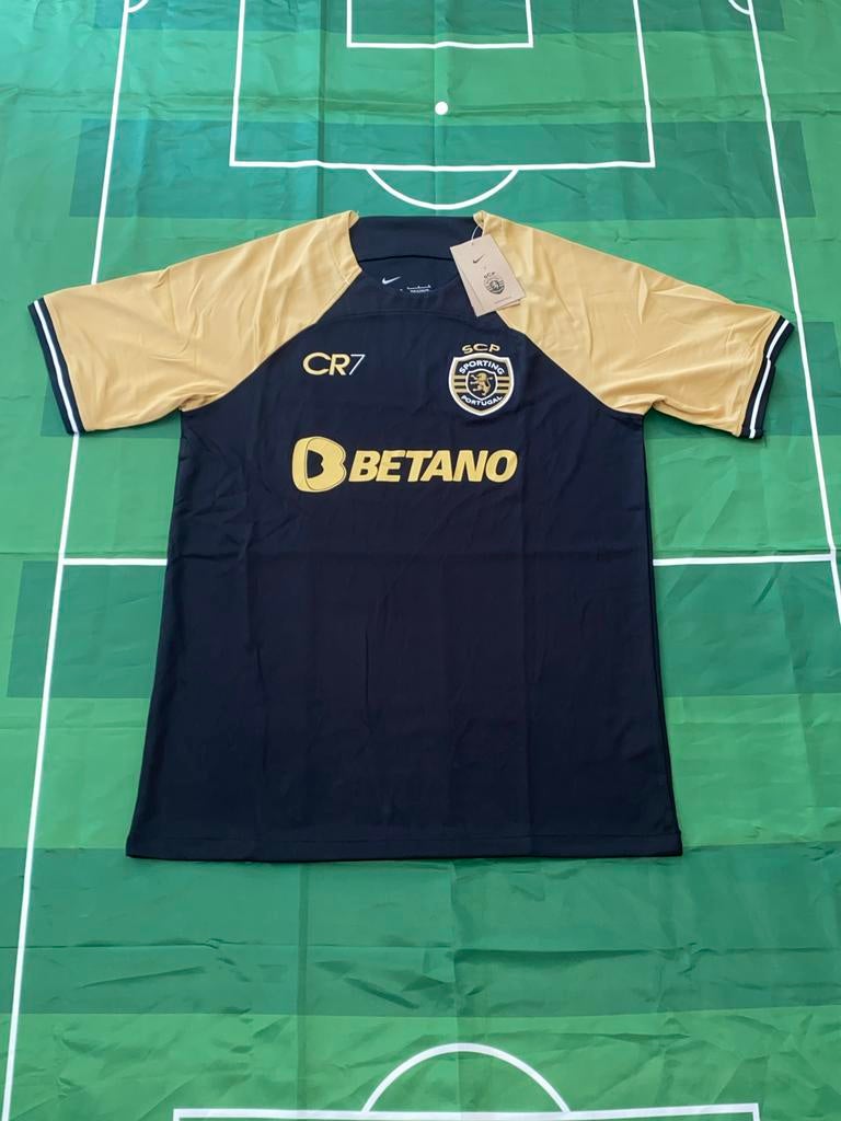 Sporting  CR7 Voetbalshirt Zwart/Goud, Sport en Fitness, Voetbal, Maat L, Ophalen of Verzenden, Nieuw, Shirt