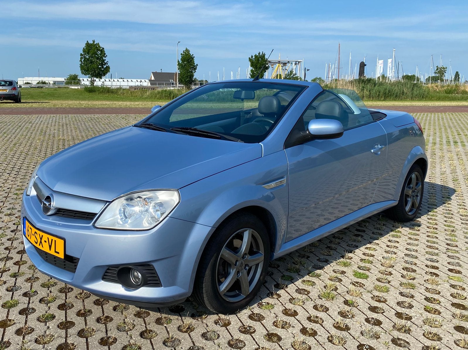 Opel Tigra Twintop 1.8 16V Sport, Auto's, Opel, 125 pk, Zwart, 4 cilinders, Blauw