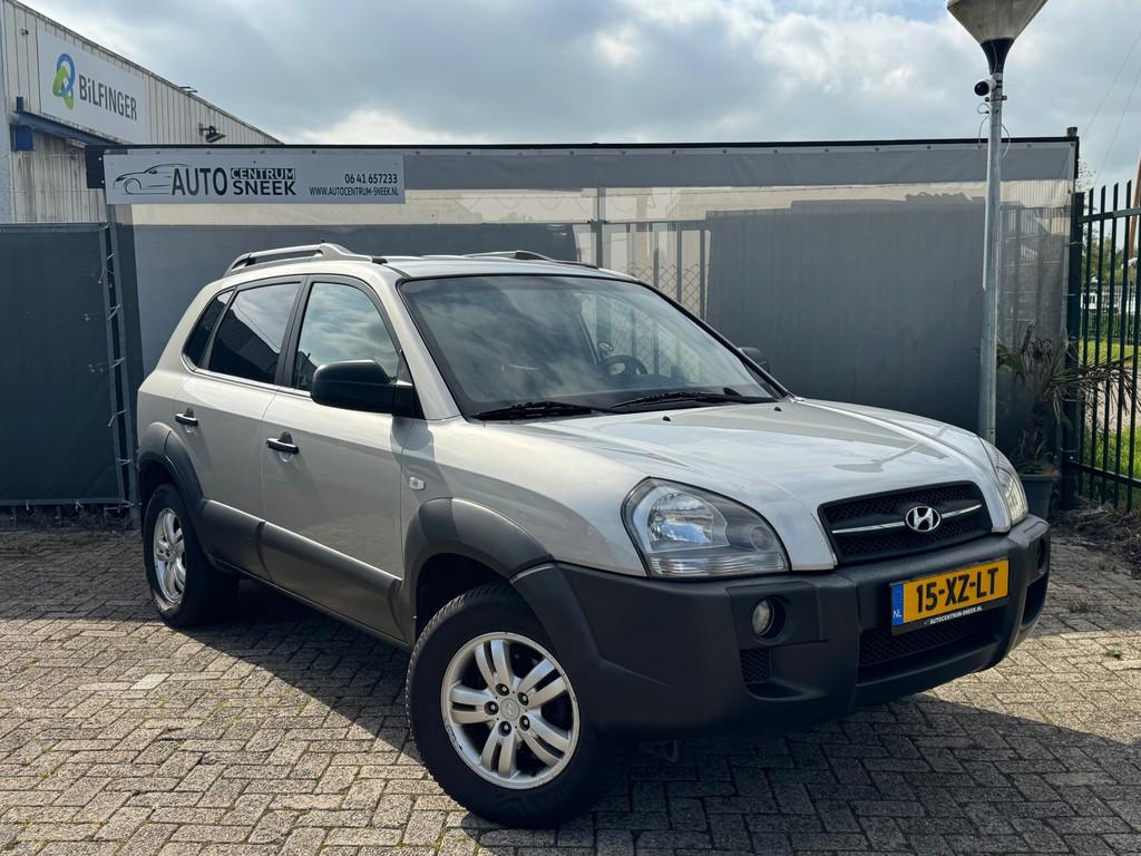 Hyundai Tucson 2.0i Dynamic - NWE APK - Airco - Cruise, Auto's, Hyundai, Stof, Gebruikt, Zwart, 4 cilinders