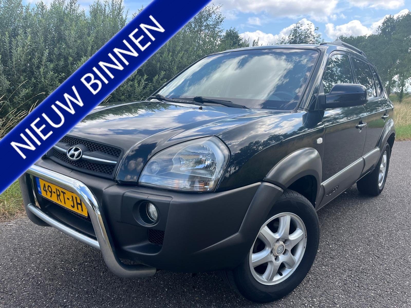 Hyundai Tucson 2.0i | Airco | Cruise | Trekhaak | APK mei 20, Auto's, Gebruikt, 4 cilinders, Zwart, Origineel Nederlands