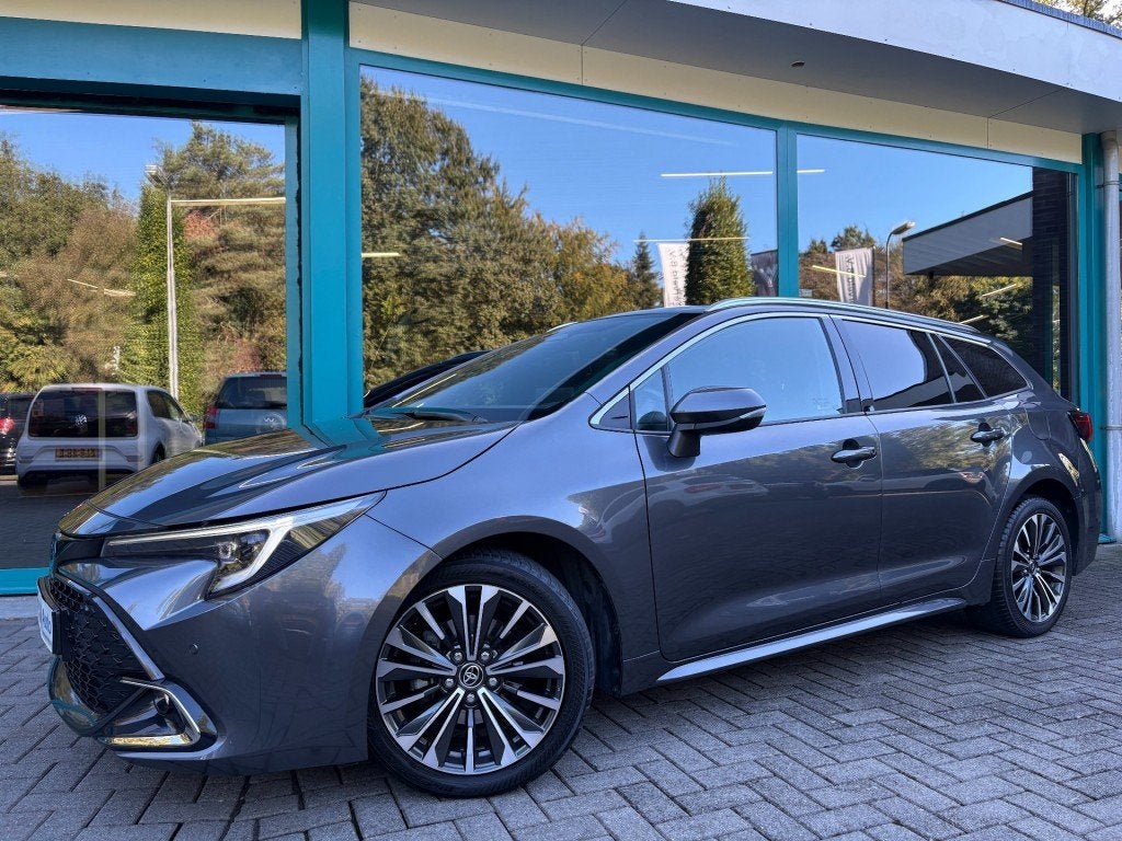 Toyota COROLLA TOURING SPORTS 1.8 HYBRID 140 ACTIVE CarPlay,, Auto's, 450 kg, Gebruikt, 750 kg, Corolla