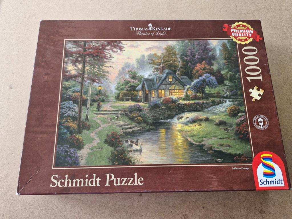 Schmidt Legpuzzel Thomas Kinkade - Cottage aan de Rivier, Ophalen of Verzenden, 500 t/m 1500 stukjes, Gebruikt, Legpuzzel