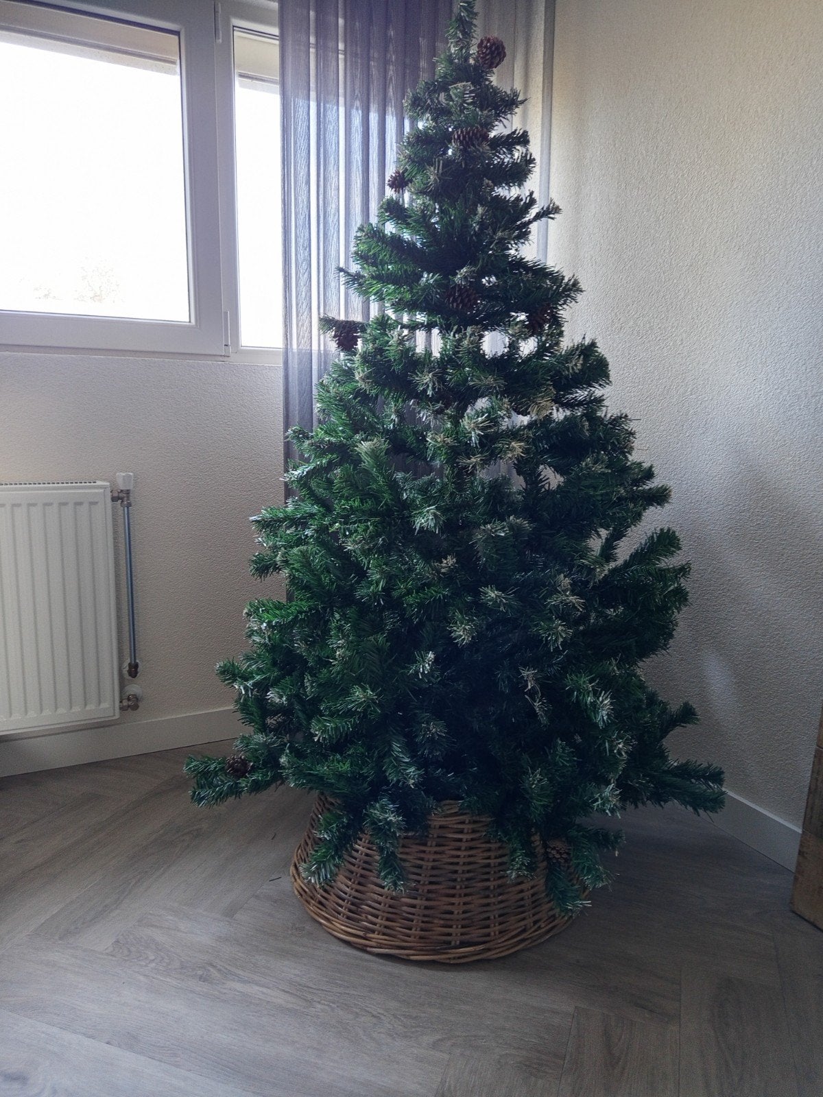 Kerstboom met mand, Ophalen