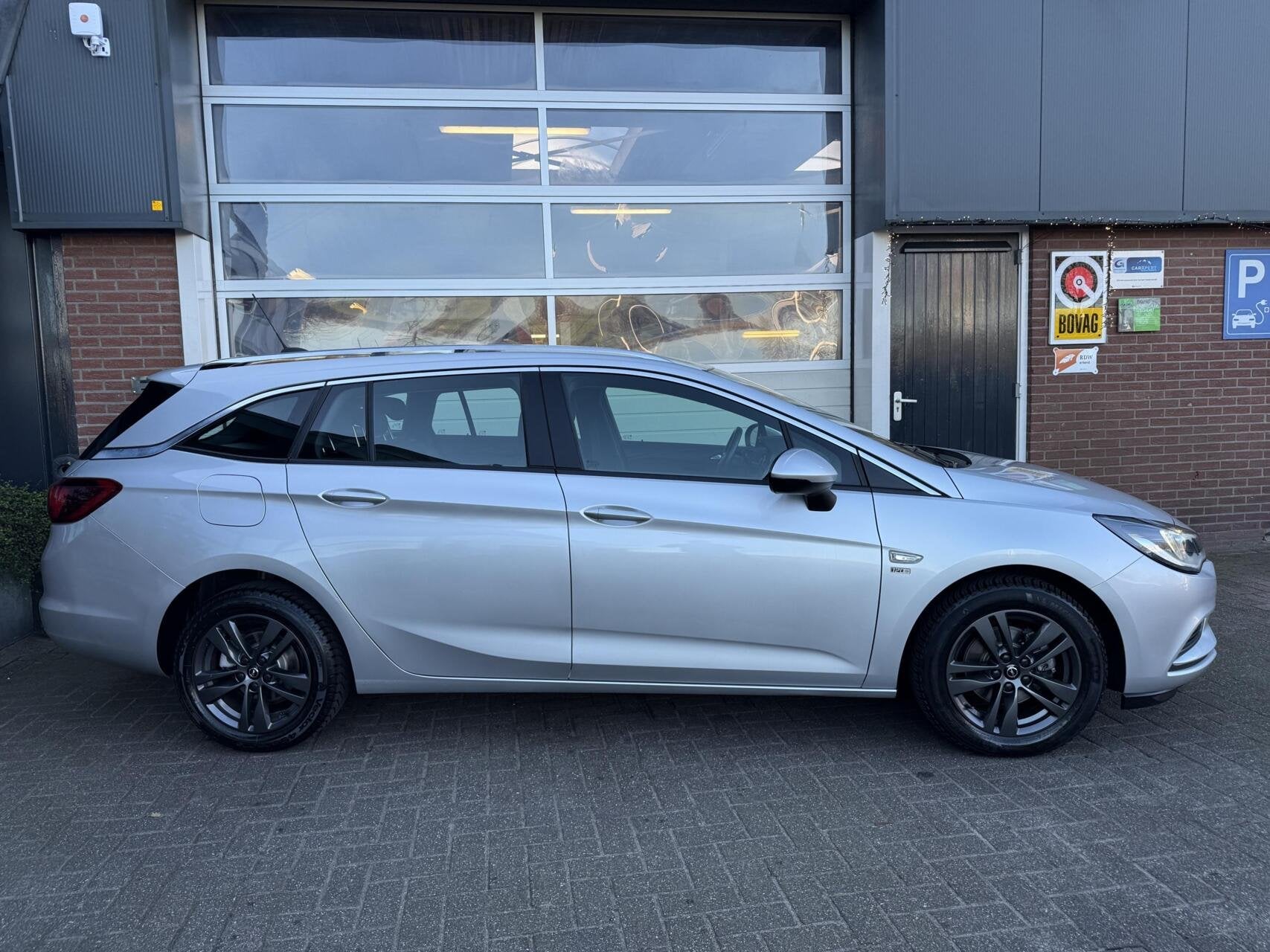 Opel Astra Sports Tourer 1.0 Turbo 120 Jaar Edition *ALL-IN, Auto's, Voorwielaandrijving, 12 maanden, Stof, 1178 kg
