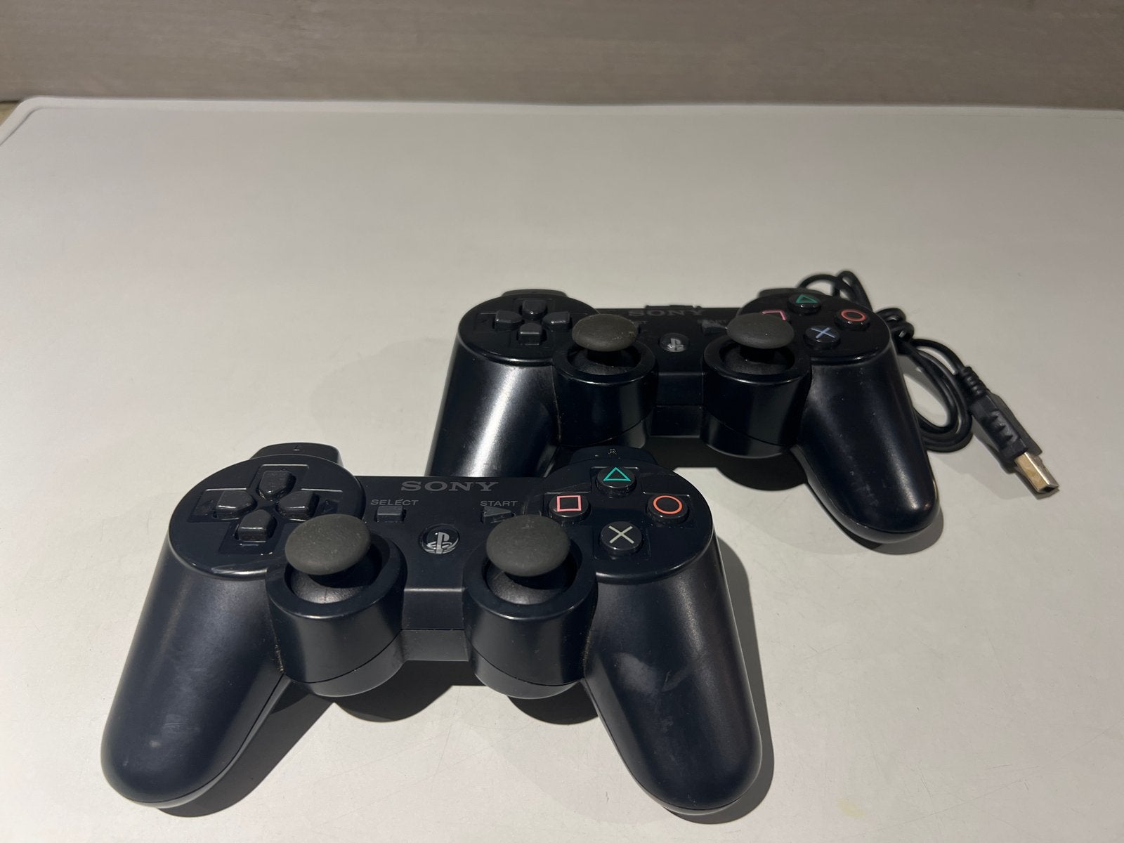 2x Sony PlayStation 3 DualShock 3 Controllers, N, PlayStation 3, Ophalen of Verzenden, N