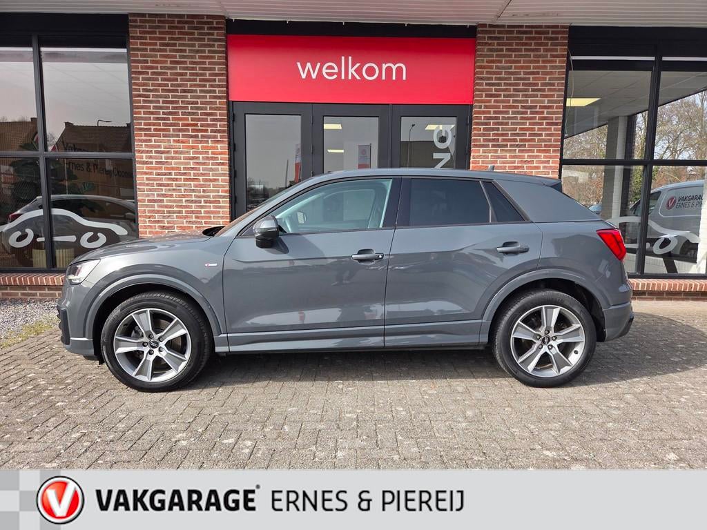 Audi Q2 1.0 TFSI S-Line *Garantie mogelijk tot 14-08-2028, Auto's, Voorwielaandrijving, Stof, Gebruikt, 116 pk
