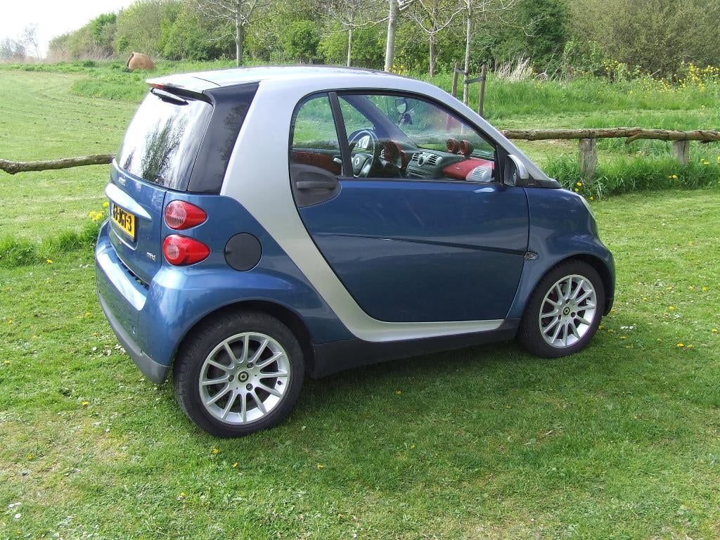 Smart ForTwo 1.0 52KW Coupe MHD AUT 2009, Stof, 18 €/maand, 23 km/l, Origineel Nederlands