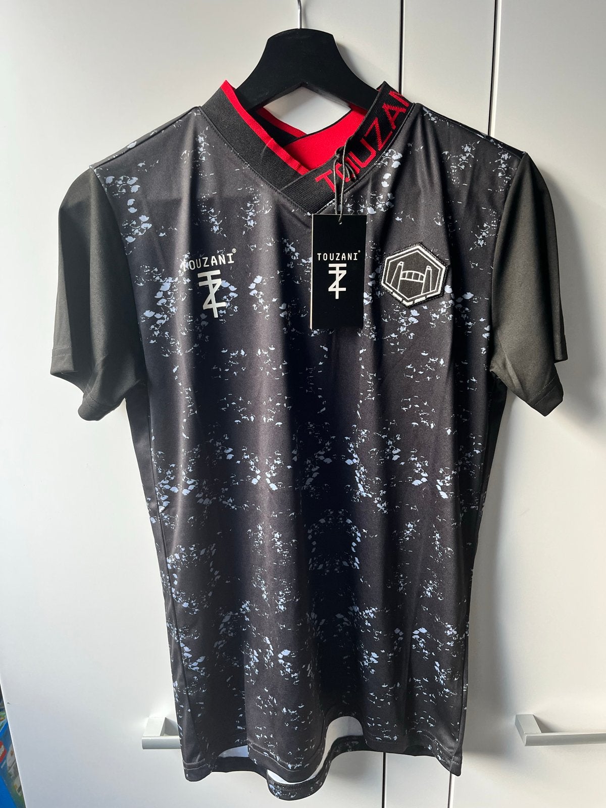 Touzani Kohaku Panna voetbalshirt zwart maat 170/176 NIEUW, Ophalen of Verzenden, Nieuw, Jongen of Meisje, Sport- of Zwemkleding