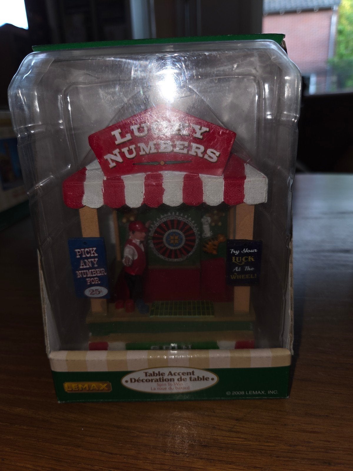 Lemax carnival Spin to win ook wel bekend als.lucky numbers., Ophalen