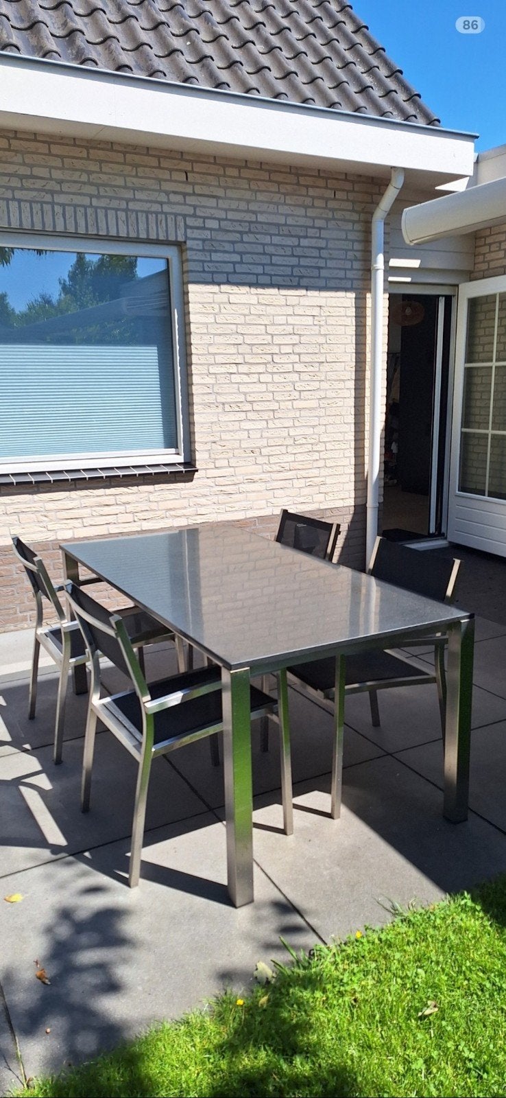 RVS Tuinset met zwart granieten tafelblad (180 x 90), 4 zitplaatsen, Ophalen of Verzenden, Zo goed als nieuw, Rvs