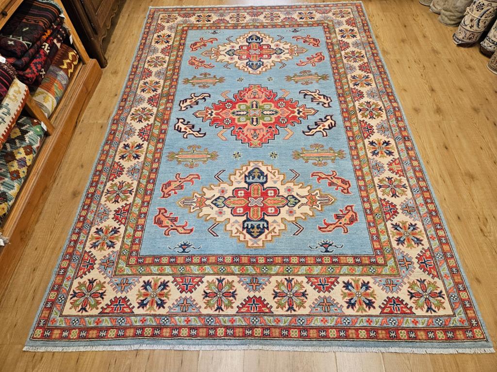 Handgeknoopt oosters tapijt kazak 291x200
