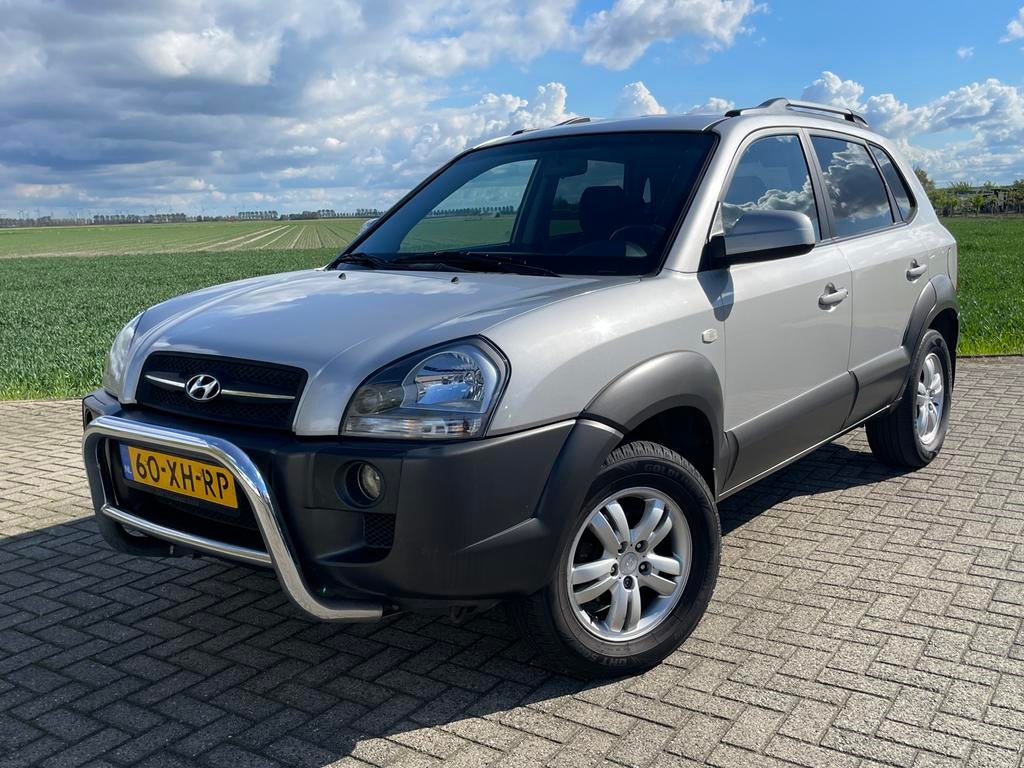 Hyundai Tucson 2.0 I 2WD 2007 Grijs, Auto's, Hyundai, Stof, Zwart, 4 cilinders, Origineel Nederlands