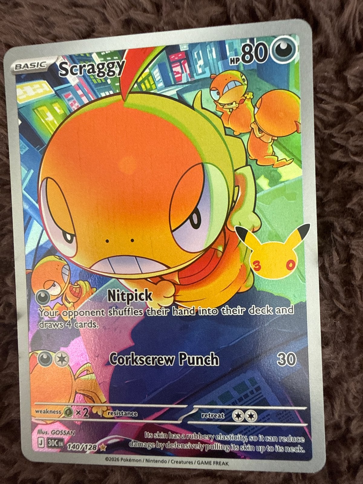 Pokémon Kaart Scraggy 140/128 Celebrations Foil, Ophalen of Verzenden, Zo goed als nieuw, Losse kaart, Foil