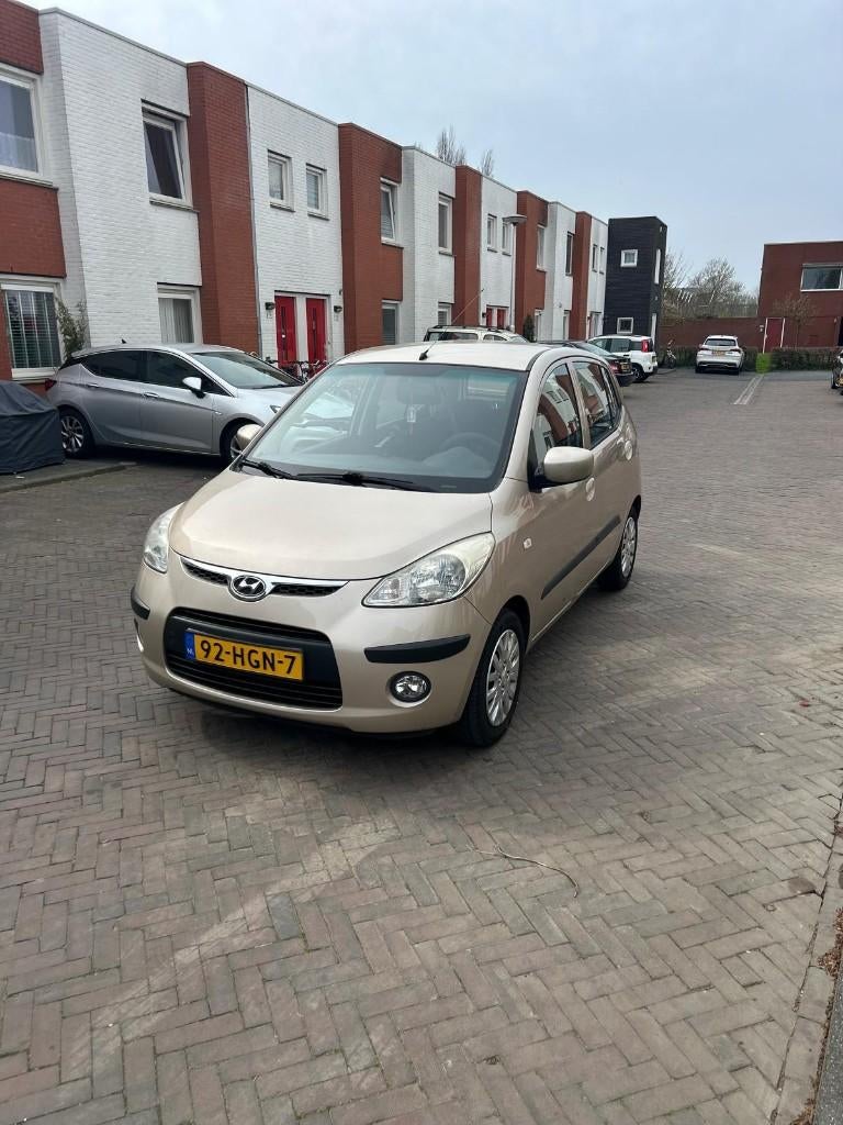 Hyundai i10 1.1I 5DR AUT 2008 met nieuwe APK (23-03-2027), Stof, 4 cilinders, Beige, Origineel Nederlands