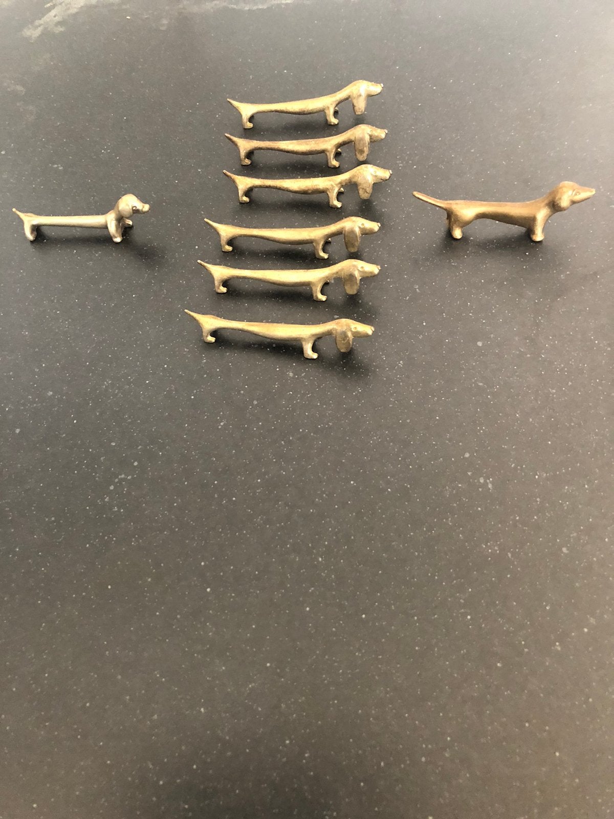 8 Antieke koperen / bronzen messenleggers tekkels., Ophalen of Verzenden