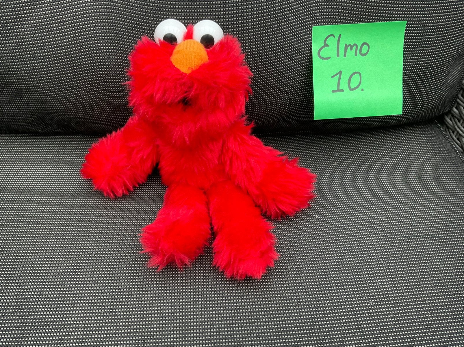 Nieuwe zgan Elmo knuffel van Sesamstraat 20cm, Ophalen, Overige figuren, Nieuw, Beeldje of Figuurtje
