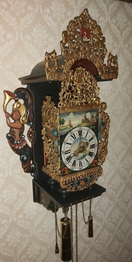 stoelklok dagloper met wekkerwerk, Ophalen