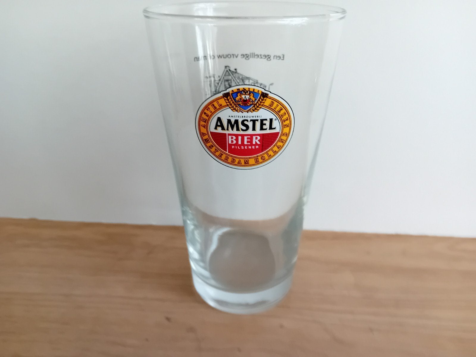 Amstel glas nummer 5 met achteropdruk, Verzamelen, Ophalen of Verzenden, Zo goed als nieuw, Glas of Glazen, Amstel