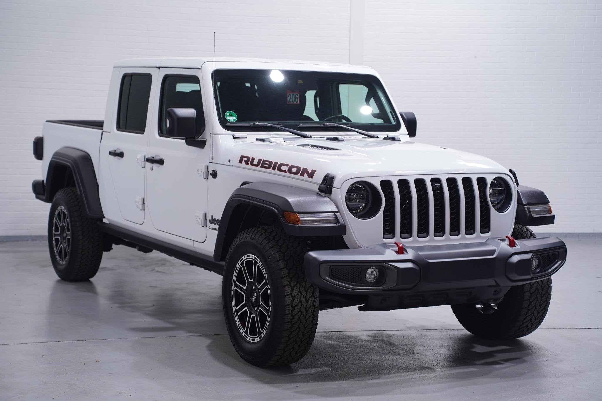 Jeep Gladiator 3.6 V6 285 pk Rubicon Grijs Kenteken 2-Zits N, Auto's, Gebruikt, Wit, Bedrijf, Vierwielaandrijving