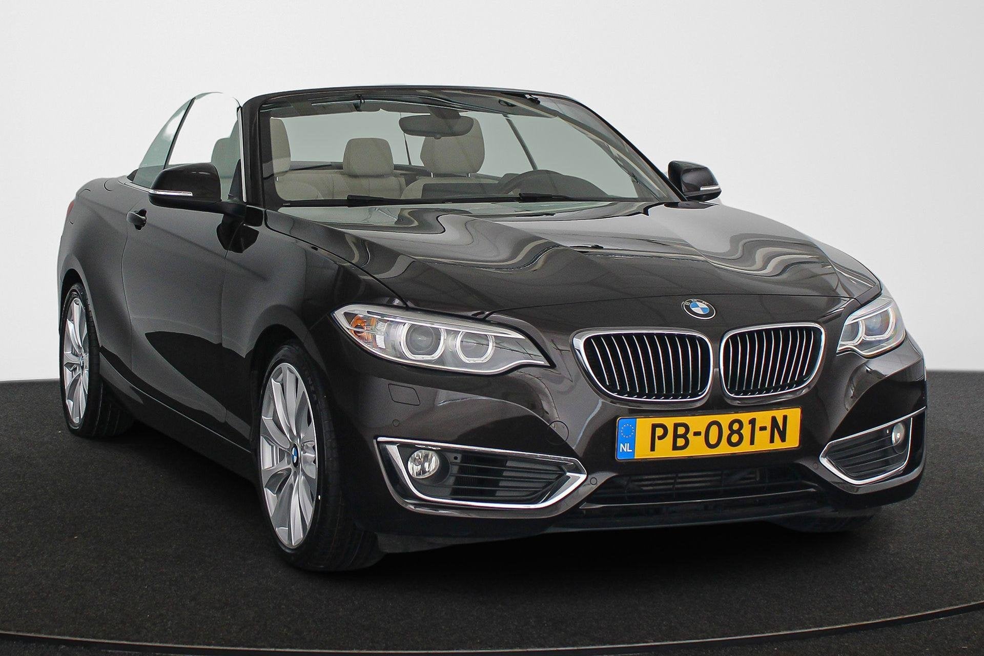 BMW 2-serie Cabrio 218i High Executive Luxury Line Stoelverw, Auto's, Automaat, Gebruikt, Euro 6, 4 stoelen