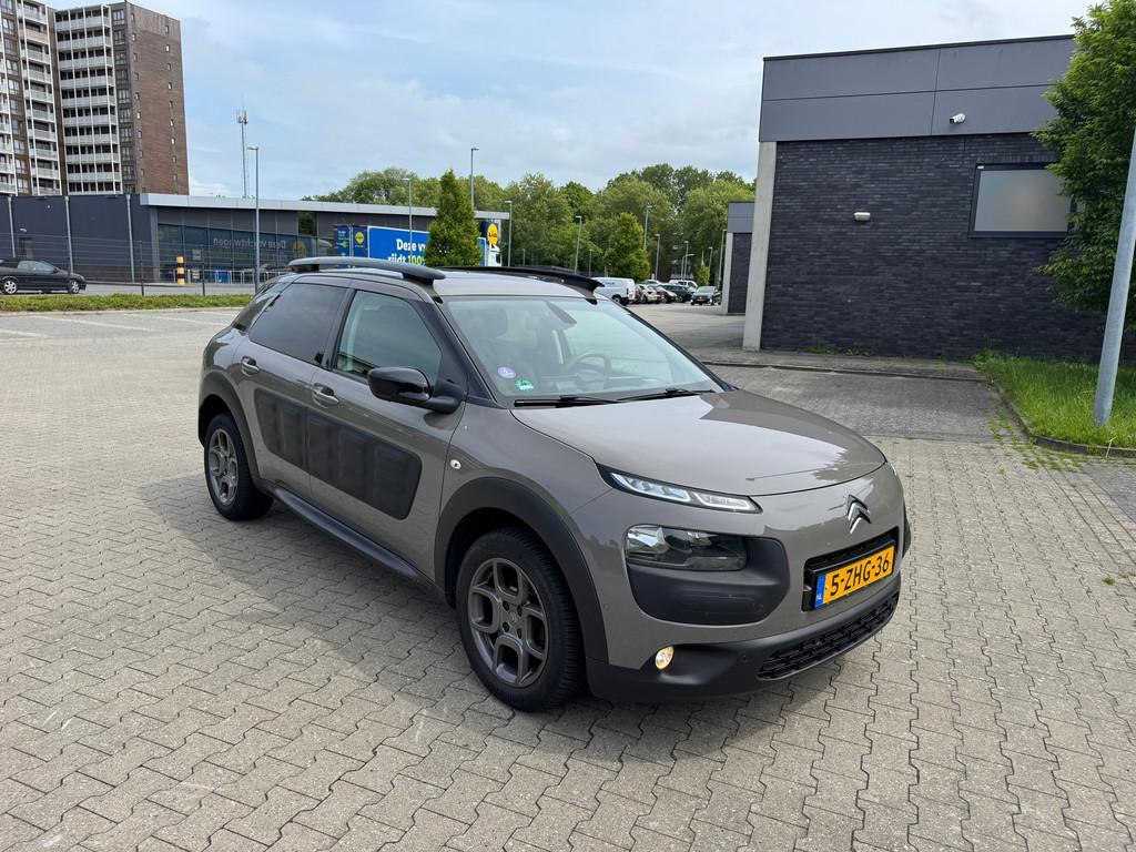 Citroen C4 Cactus 1.2 e-VTi Shine Automaat, Stof, Bruin, 82 pk, 23 km/l