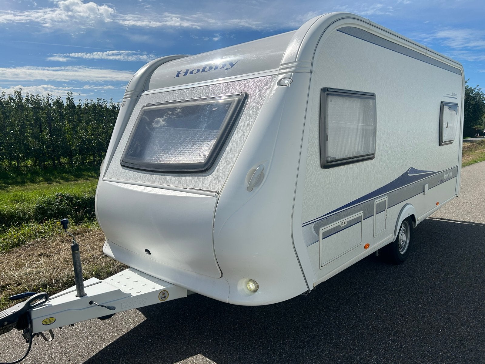 Hobby De Luxe 455UF met voortent Airco Rondzit Dwarsbed, Caravans en Kamperen, Rondzit, Hobby, Dwarsbed, Ringverwarming