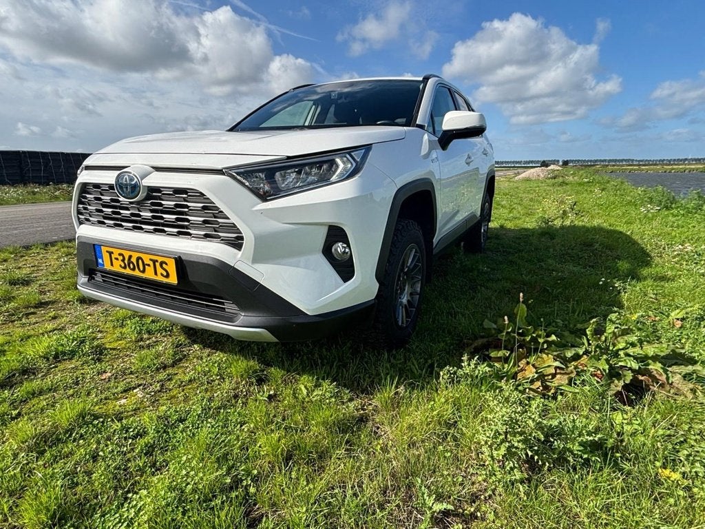 Toyota RAV4 2.5 Hybrid AWD Overlander Nieuwe APK 4x4, Stof, Gebruikt, 4 cilinders, 2487 cc