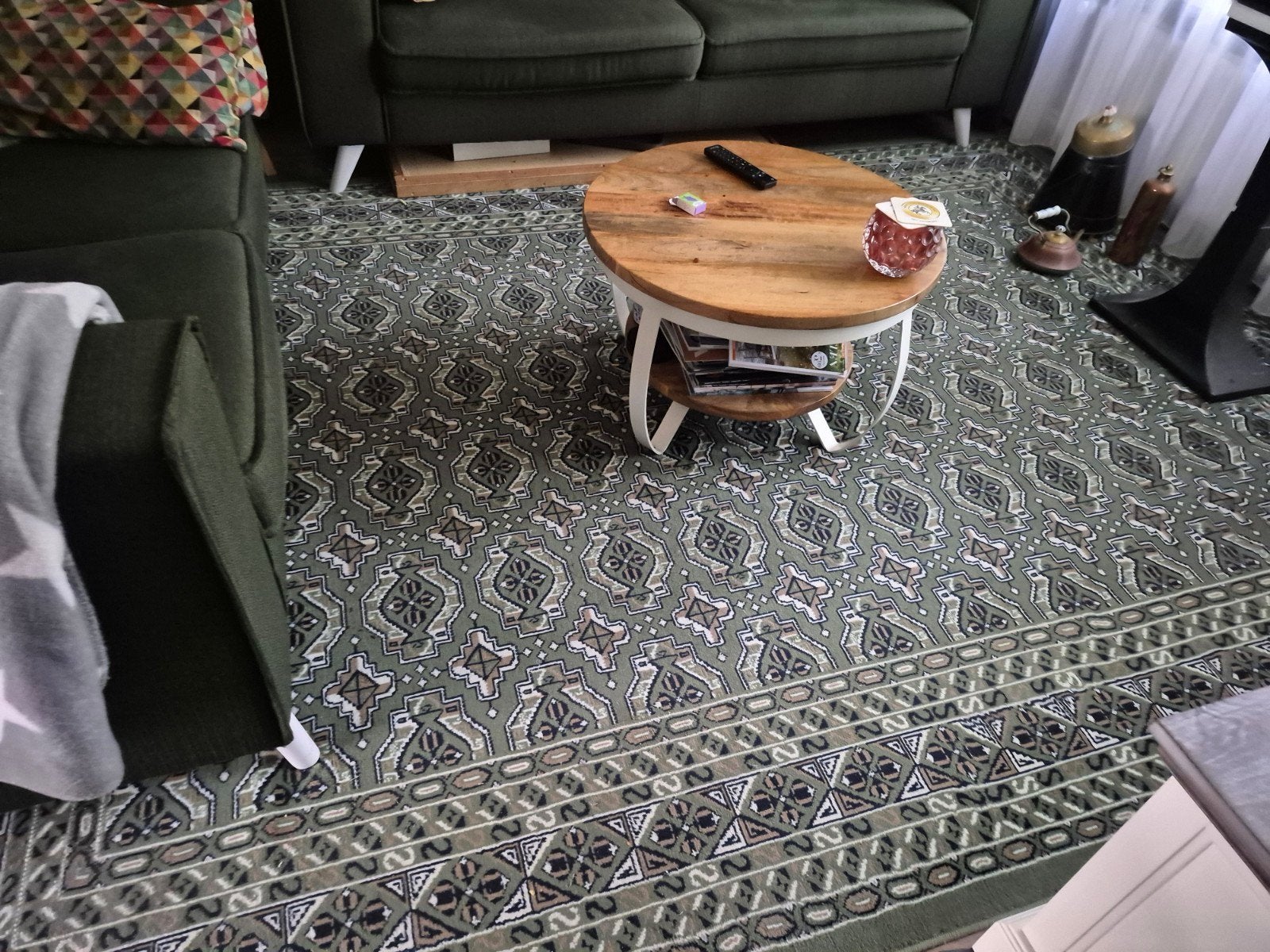 Groen vloerkleed met patroon