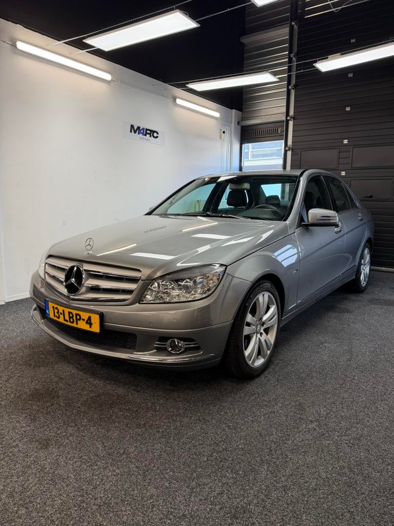 Mercedes-Benz C-Klasse 1.6 C180 Kompr. Sedan 2010 Grijs, Auto's, Mercedes-Benz, Leder en Stof, Handgeschakeld, Grijs, Sedan