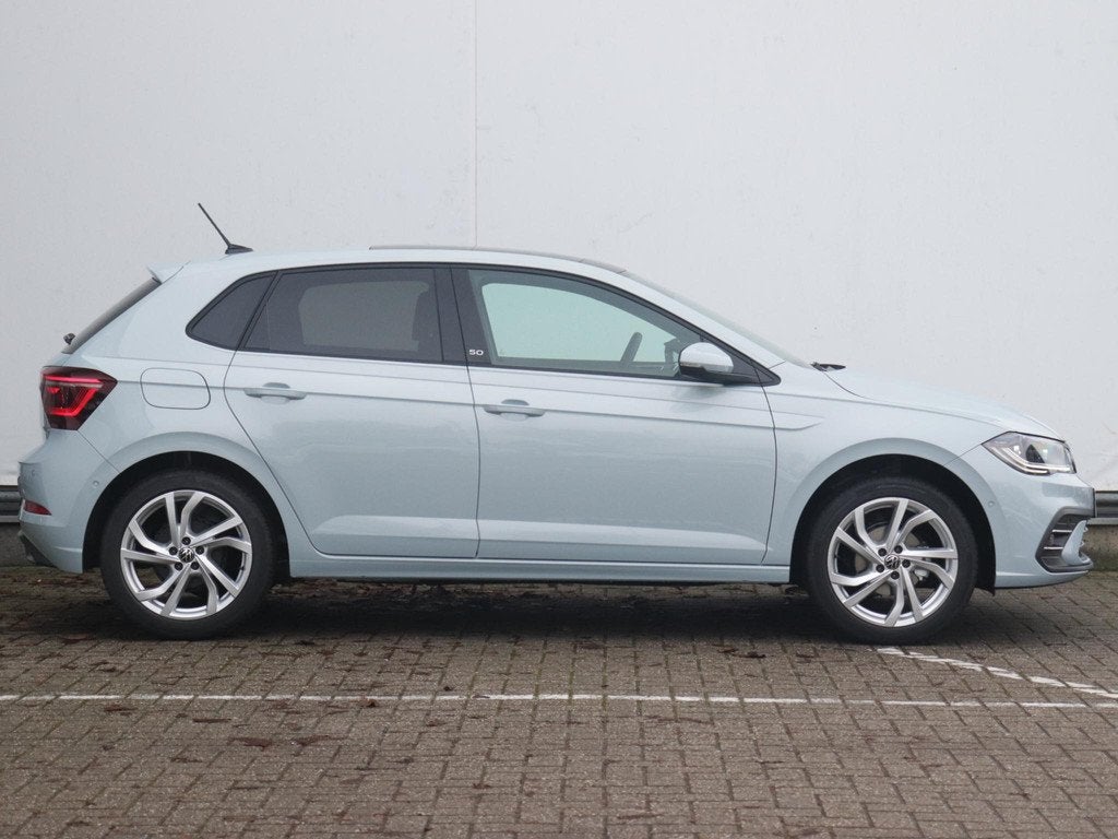 Volkswagen Polo 50 Edition 1.0 TSI 95 PK | Adaptieve Cruise, Auto's, Volkswagen, Stof, 95 pk, Blauw, Bedrijf
