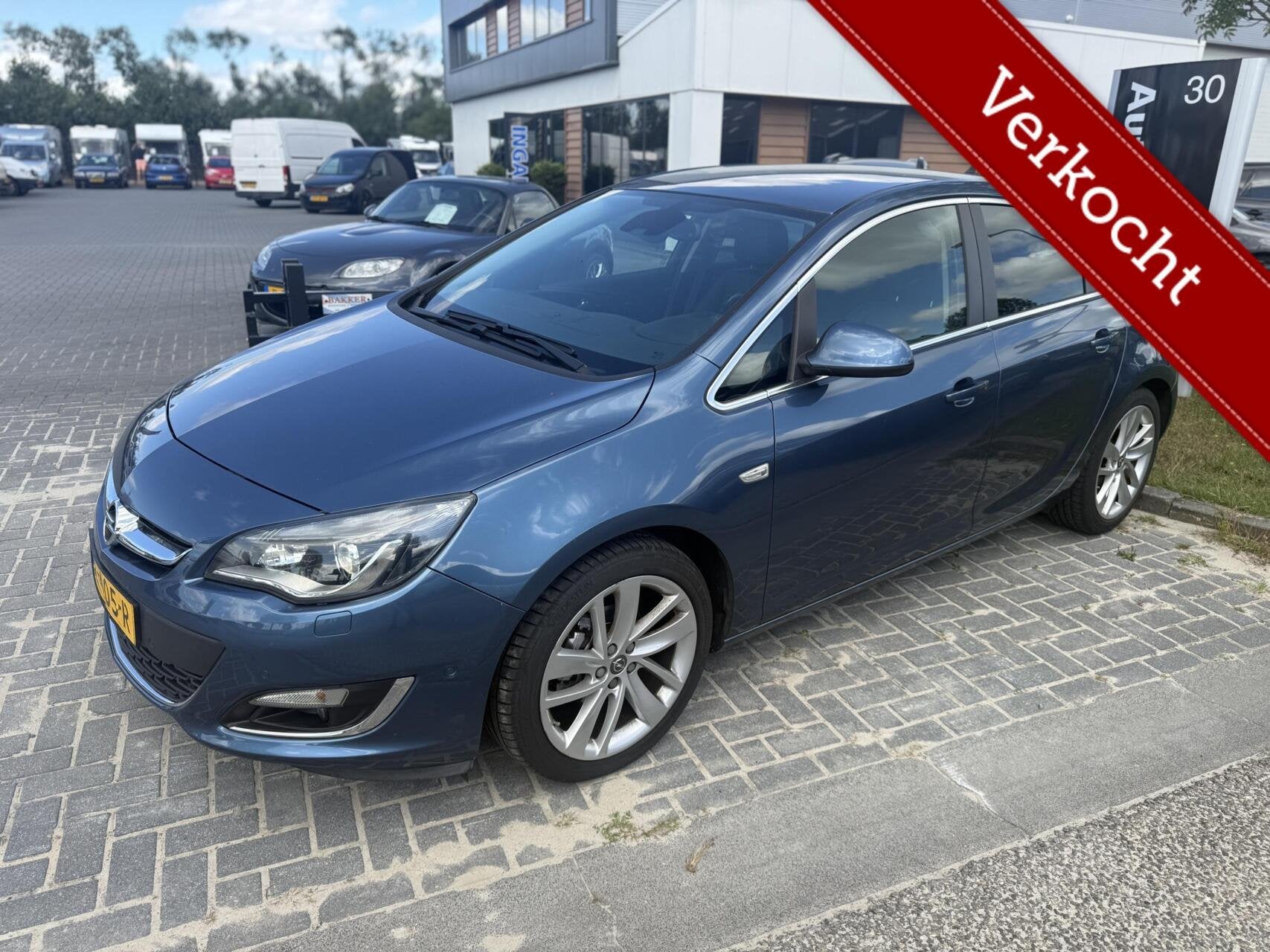 Opel Astra 1.4 Turbo Sport + NAVI,CAMERA,18 INCH,CRUISE,LEER, Auto's, Opel, Gebruikt, 4 cilinders, Met garantie (alle), Blauw