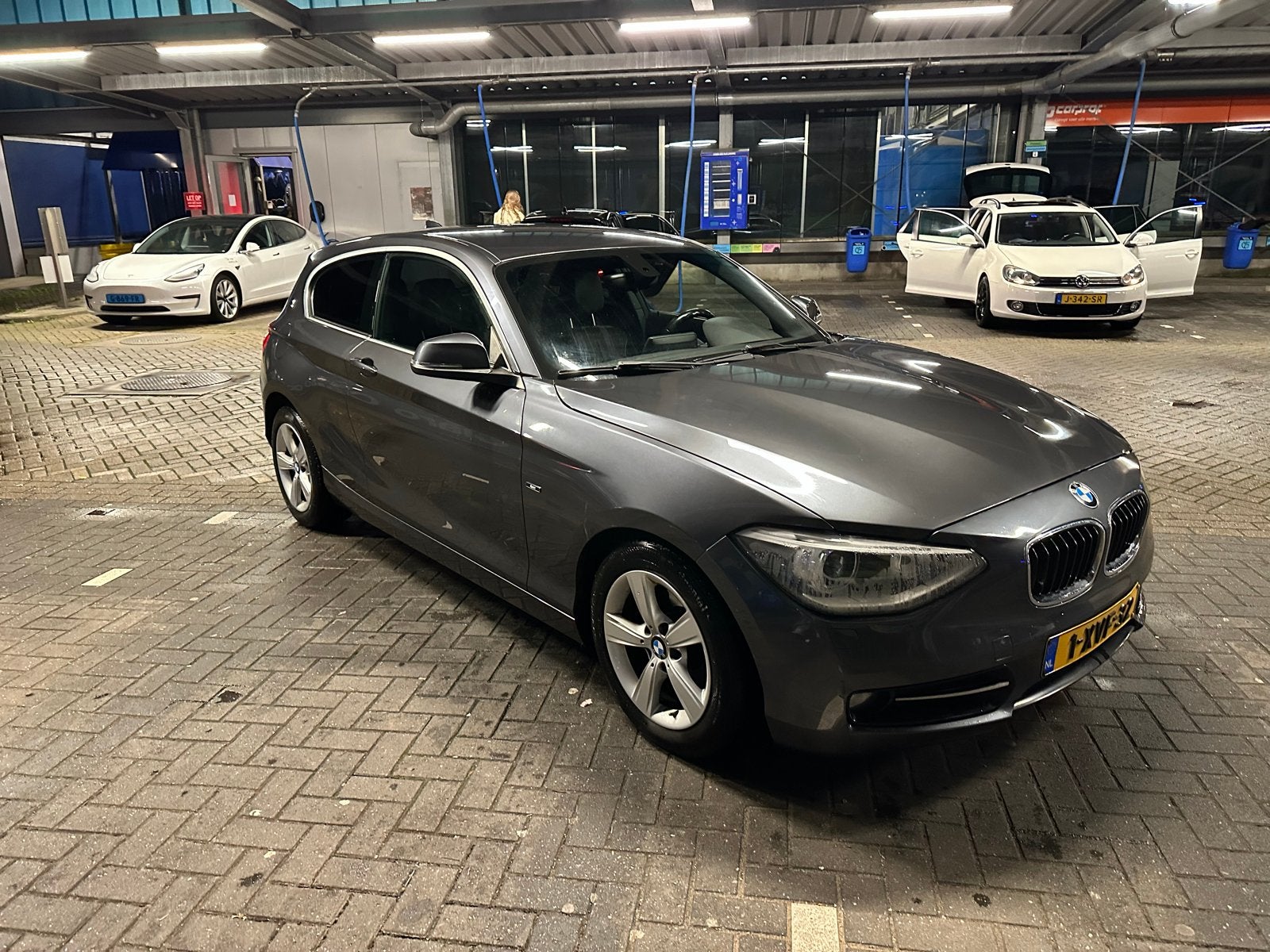 BMW 1-Serie 114I 75KW 3-DR 2014 Grijs, Auto's, BMW, 1-Serie, Achterwielaandrijving, 4 cilinders, 19 km/l