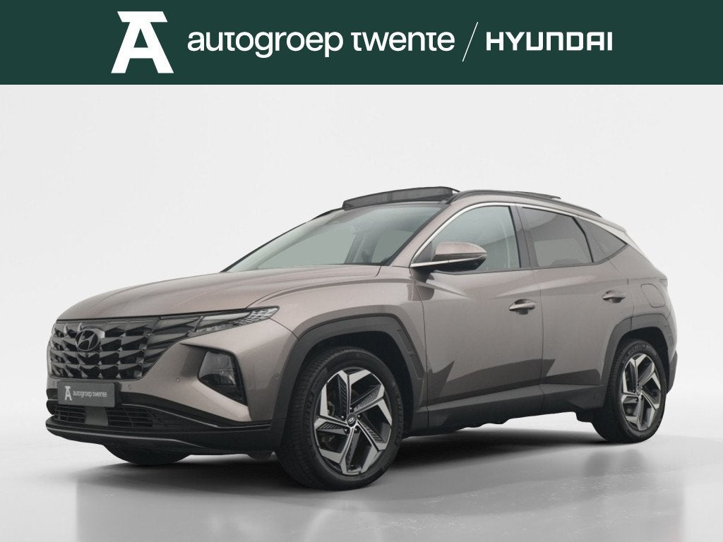 Hyundai Tucson 1.6 T-GDI PHEV 4WD 6AT 265PK Premium Sky | Pa, Auto's, 14 kWh, Gebruikt, 4 cilinders, Bedrijf