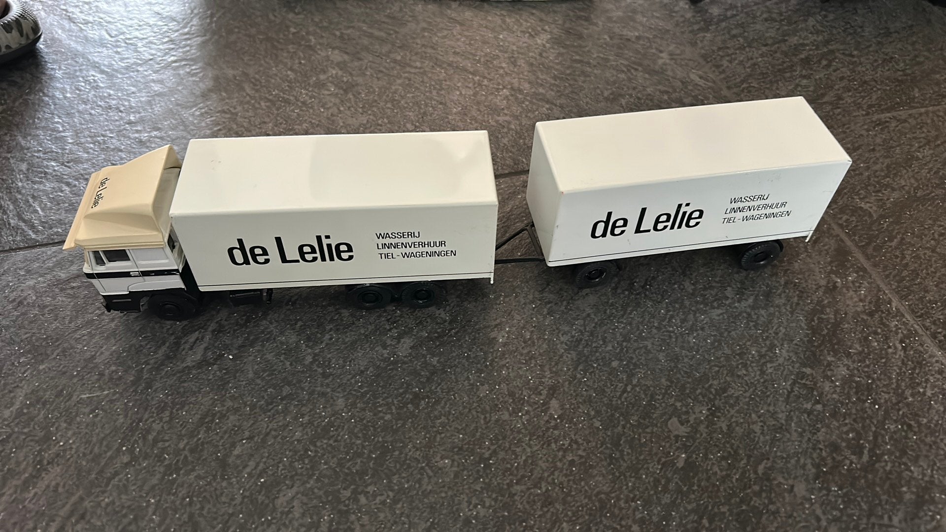 DAF auto met reclame, Ophalen of Verzenden, Zo goed als nieuw, Bus of Vrachtwagen, Lion Toys