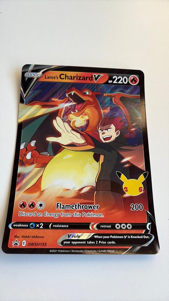 Lance Charizard V Celebrations (JUMBO KAART!), Ophalen of Verzenden, Zo goed als nieuw, Losse kaart, Foil