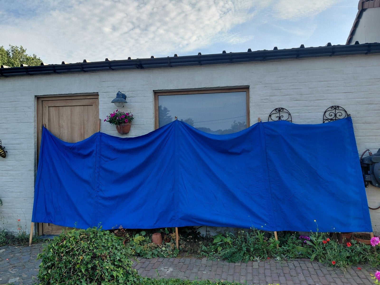 Blauw windscherm, Ophalen