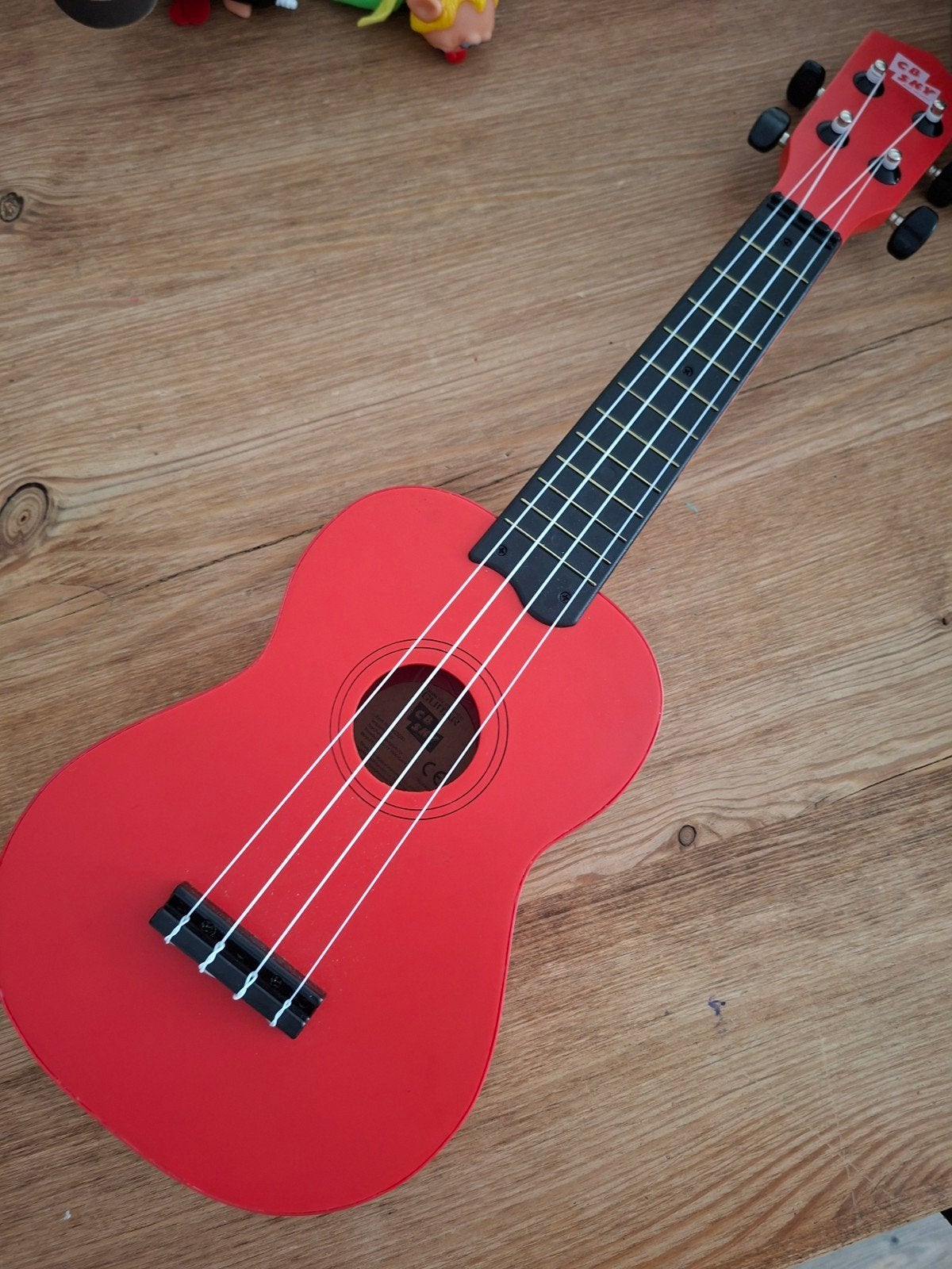 Rode speelgoedgitaar / ukelele voor kinderen, Ophalen of Verzenden, Zo goed als nieuw, Jongen of Meisje