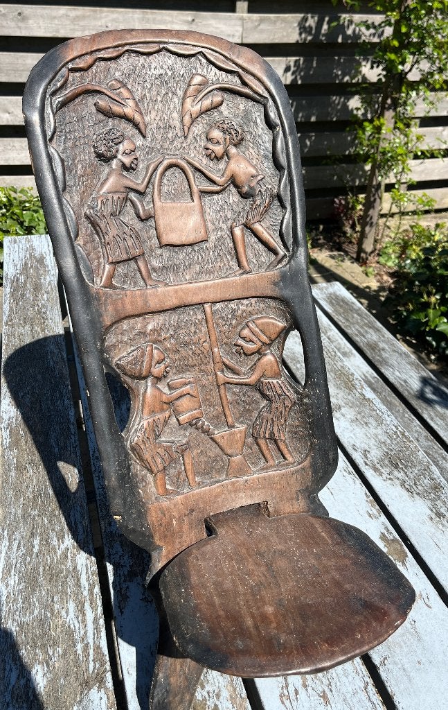 Vintage Afrikaanse vouwstoel met houtsnijwerk, Antiek en Kunst, Ophalen