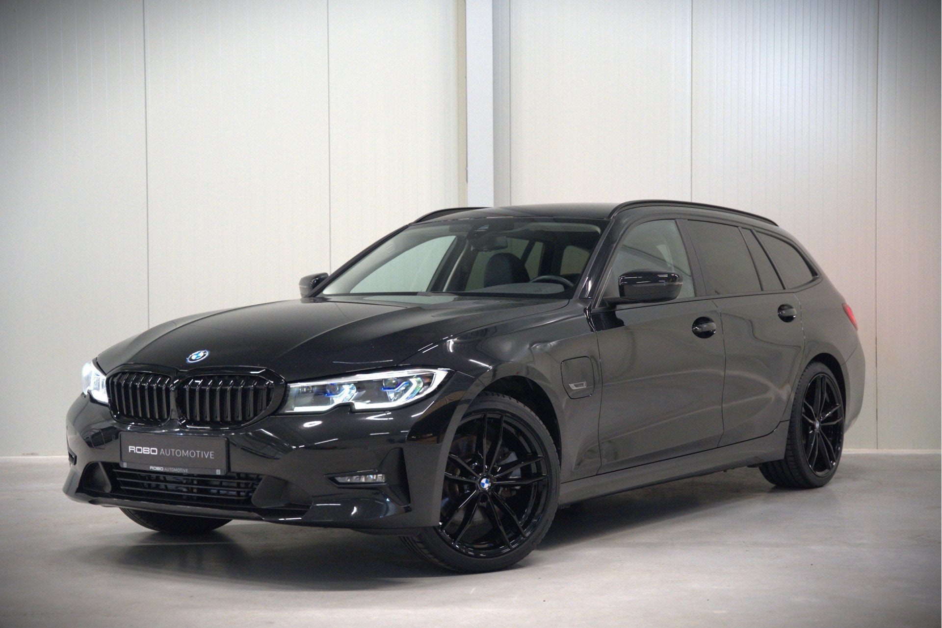 BMW 3 Serie Touring 320e Business Edition Plus | Stoelverwar