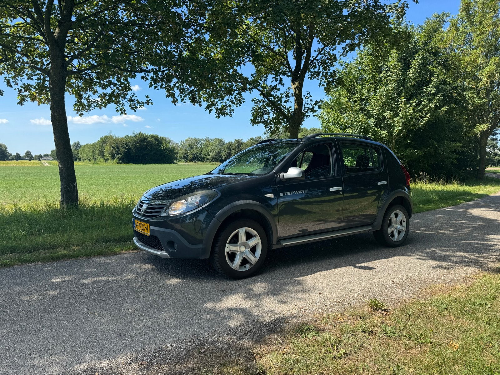 Dacia Sandero 1.6 MPI 90 Stepway 2011 Grijs, 40 €/maand, 4 cilinders, 1070 kg, Origineel Nederlands