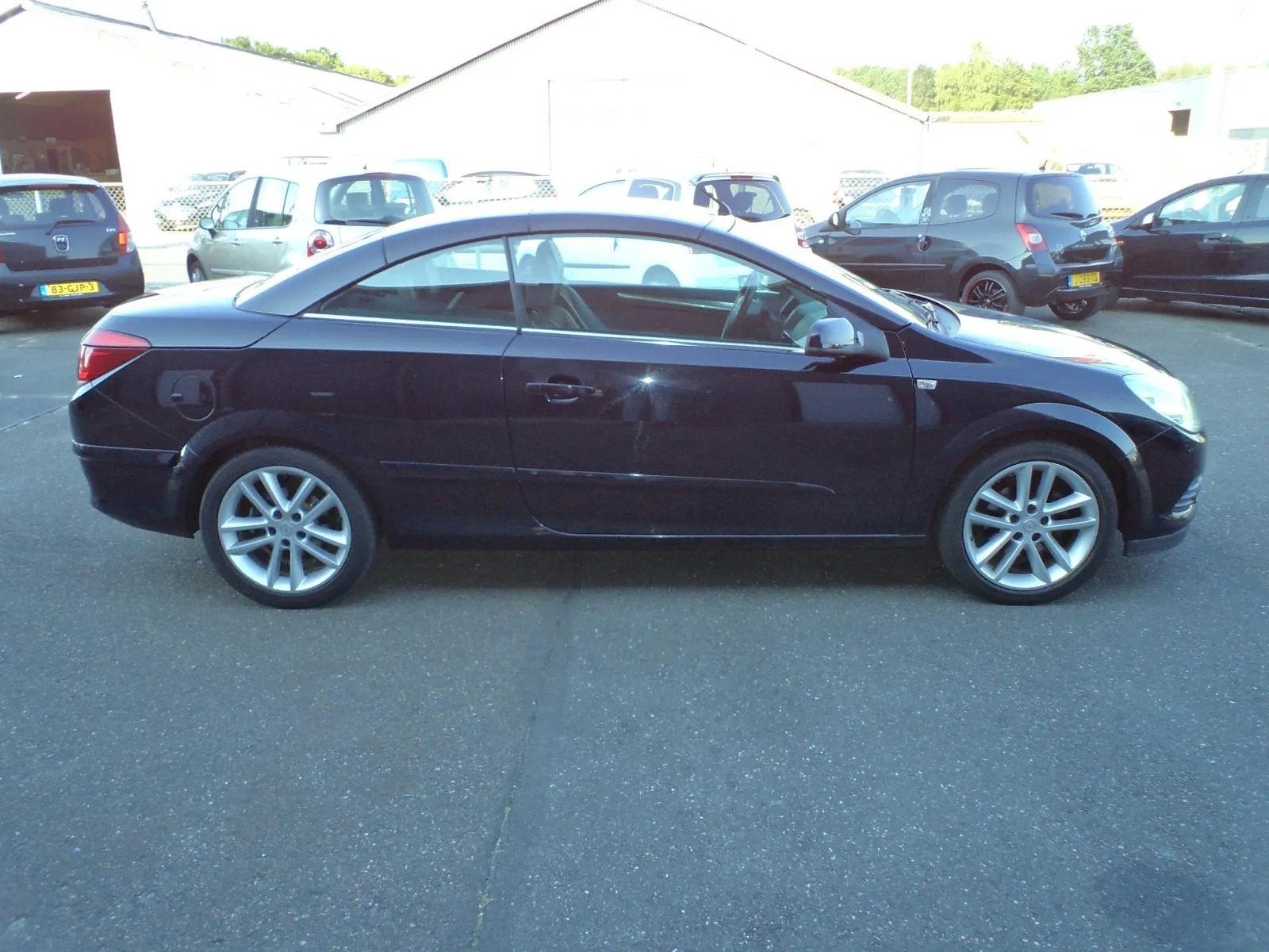 Opel Astra TwinTop 1.8 Temptation, Gebruikt, Zwart, 4 cilinders, Cabriolet