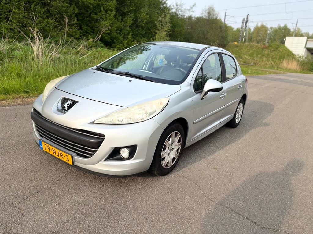 Peugeot 207 1.4 VTI 16V 5DRS 2010 Grijs, Auto's, Voorwielaandrijving, Origineel Nederlands, Handgeschakeld, Zilver of Grijs