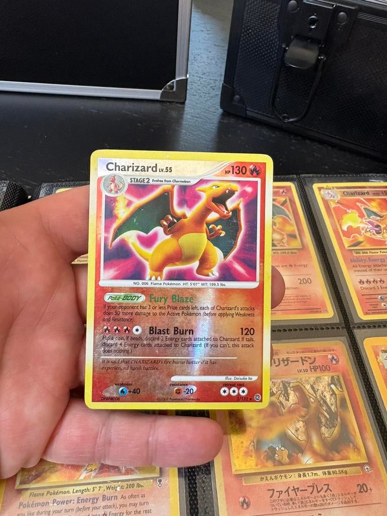 Charizard secret wonders, Ophalen of Verzenden, Zo goed als nieuw, Meerdere kaarten, Foil